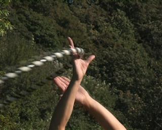 hooping overhead hand pass